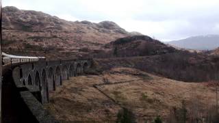 preview picture of video 'The Statesman Land Cruise Train crossing the Glenfinnan Viaduct March 8th 2014'