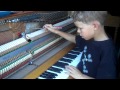 James helps set up and tune a Kawai piano 