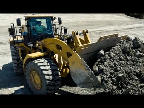 Huge Caterpillar 994 Wheel Loader Loading Caterpillar 777F Dumpers.