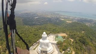 Crazy paragliding take off in rotor near Phuket Big Budda.