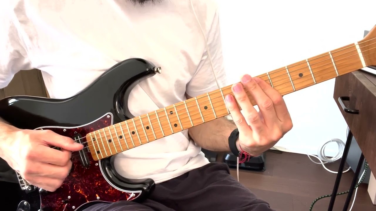 Roberto Barlocci playing the intro riff of Mood by 24kGoldn on electric guitar