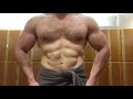 Post arms and shoulders workout flexing