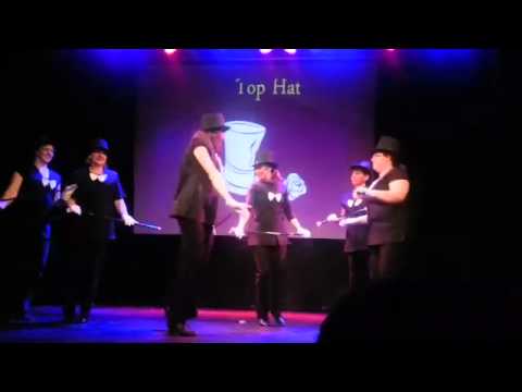 JB putting on her Top Hat