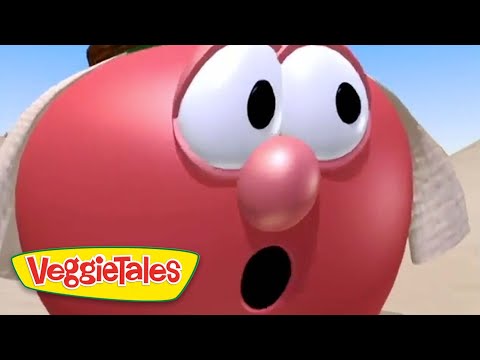 Close-up of a red VeggieTales character with wide eyes and open mouth, desert background, VeggieTales logo in the corner.