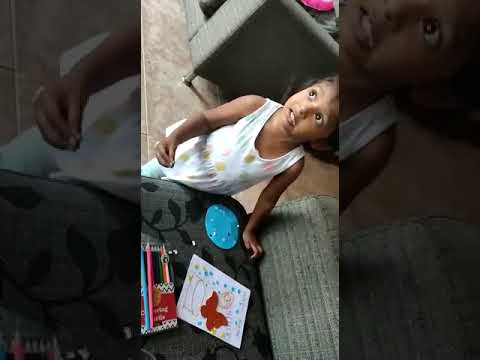 Linaya making daddy’s birthday card 3years