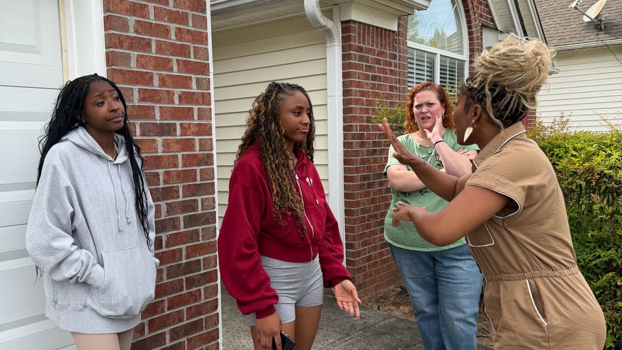 Sharra snaps on Destiny and Bethany stands in the background trying to be quiet