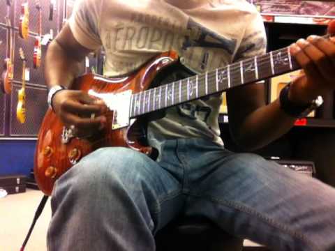 Chris Payton shedding in Guitar Center