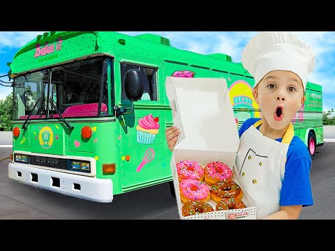 Kids explore Uncle's Baking Bus