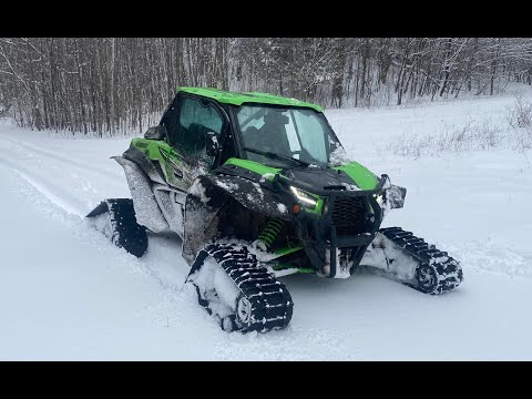 Installing snow tracks on a sport UTV