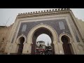 Backwards Reveal Of Bab Bou Jeloud Ornate City Gate In Old City Of Fez People Walking Under Nice
