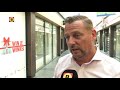 Wethouder Jos van Bree legt het idee achter de wedstrijd 'Win je winkel' uit