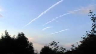 OLYMPIC RED ARROWS? NO...AEROSOL SPRAYING. UK.