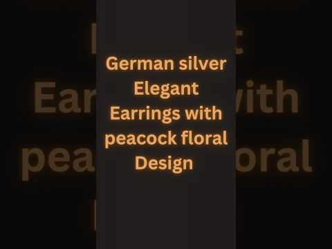 Antique German silver Jhumka Earrings with Peacock Motif