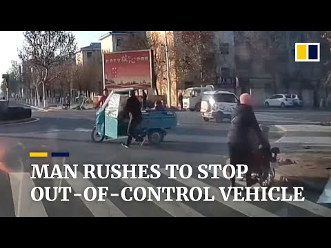 Man rushes to stop out-of-control vehicle in China
