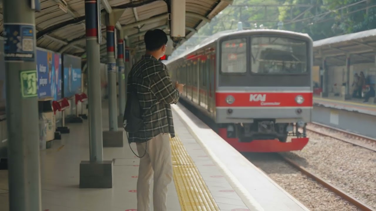Free Stock Footage | Tracking Shot of Train Pulling into Station in Jakarta