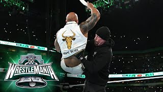 The Undertaker delivers an epic Chokeslam to The R