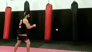 Precision and timing - boxing with a tennis ball