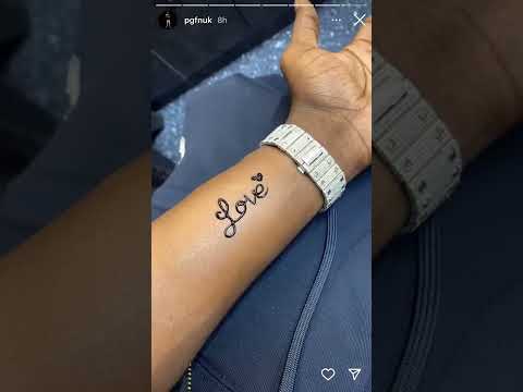 Pgf Nuk Gets Love Tatted on his arm