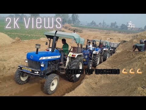 2 New Holland 3630 Vs  2 Farmtrac 60 pulled 18 ft trolley
