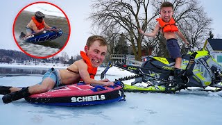 Water Skipping a Snowmobile While Pulling a Tuber!! (New Polaris Snowmobile)