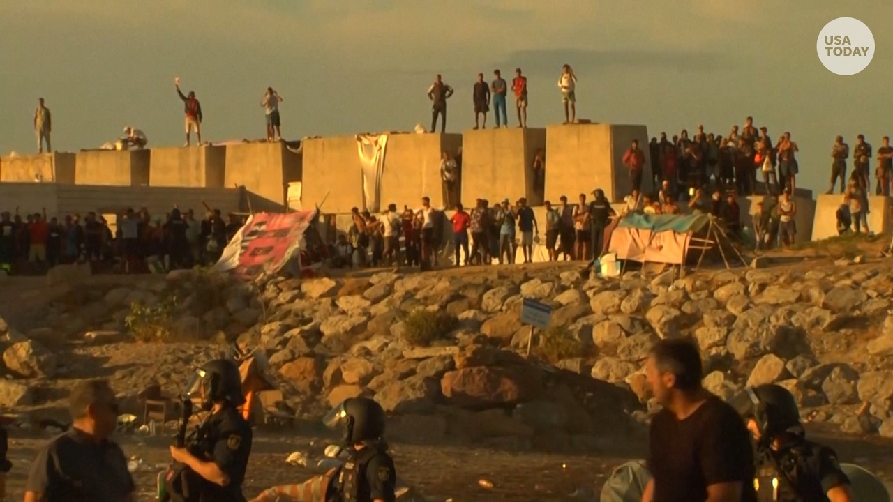 Ceuta residents destroy migrant beach camp as tensions rise in Spain