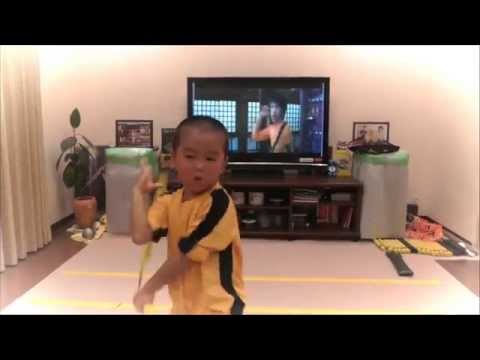 my son acting Bruce Lee's Game Of Death  Nunchaku