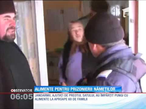 Jandarmii au împărţit alimente într-un sat rupt de lume până acum două zile din cauza nămeţ