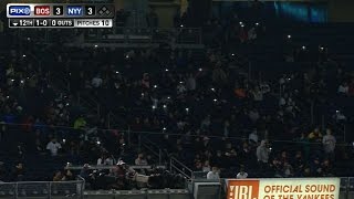 Fans light up Yankee Stadium