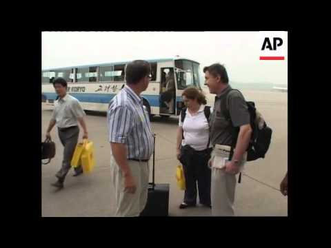IAEA inspectors arrive at the airport in Pyongyang