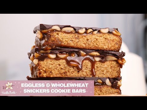 Amazing Snickers Cookie Bars! Eggless, wholewheat & jaggery cookie bars with jaggery peanut caramel!