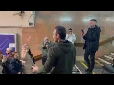 in Kharkiv, Ukraine, Svyatoslav Vakarchuk sings "Chervona Ruta"in the subway on Constitution Square.