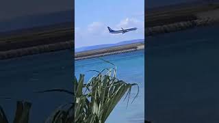 飛行機　到着　沖縄