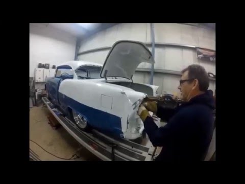 MetalWorks Classic Auto Restoration pulling a smashed 1955 Chevy quarter panel