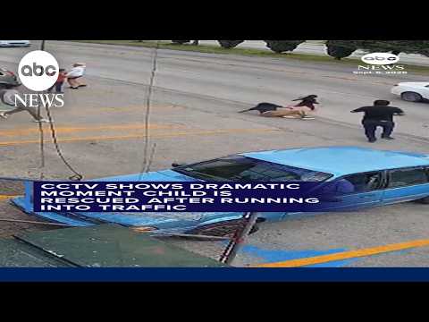 Child saved after running into traffic