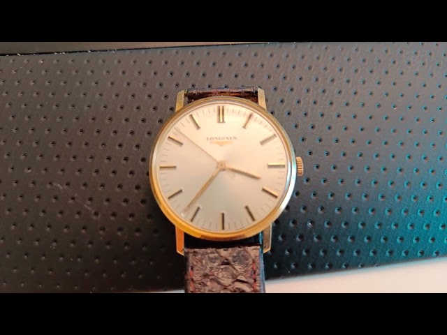 887671 Longines gold watch 18K