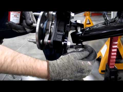 Attaching hub spindle to the lower control arm on the Rally Fighter