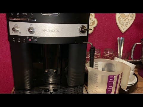 Descaling coffee machine with descaler De'Longhi Magnifica ESAM 3000.B fully automatic coffee mac...