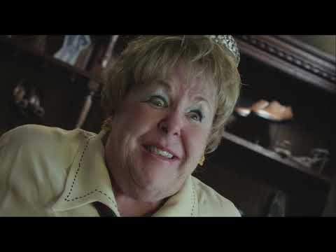 Lucky Stiff promotional still with corpse in wheelchair and lead couple in Monte Carlo