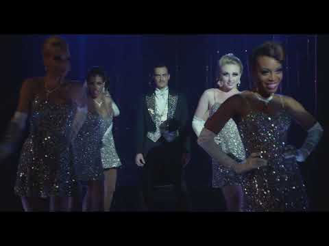 Lucky Stiff trailer composite image with Monte Carlo skyline and roulette wheel