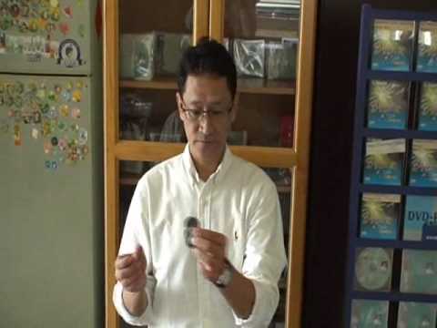 Voir la vidéo du Super Triple Coin (with DVD) Johnny Wong