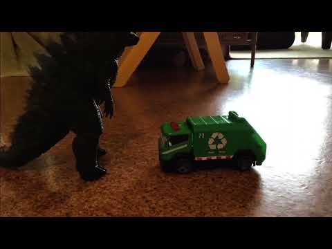 Godzilla vs garbage truck.
