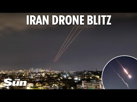 Israel blasts 300 missiles and drones out of sky after Iran launches massive barrage as sirens wail