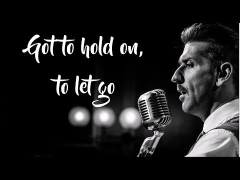 Danny Vera - Hold On To Let Go (Lyrics Video)