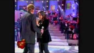 Video thumbnail of "Johnny Hallyday & Chimene Baddie - Derrière l'amour"