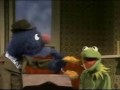 Sesame Street Grover The Earmuff Salesman