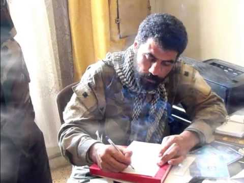 برومو يعرض صوراً للقائد باسل عيسى قائد لواء شهداء إدلب