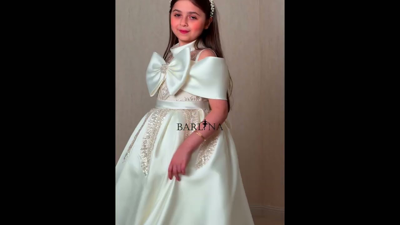Beige girls' dress with a luxurious design and elegant embroidery - year 1