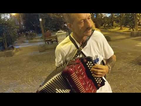 street musician having fun in Naples