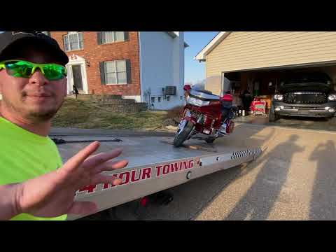 How to load a motorcycle on tow truck