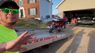 How to load a motorcycle on tow truck
